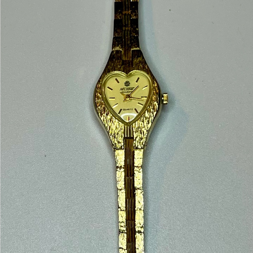 Vintage Nelsonic heart dial  gold